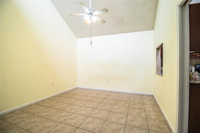 3582 Raintree Ct, Lakeland, FL 33803 - spare room with a ceiling fan, light tile patterned floors, a textured ceiling, and high vaulted ceiling