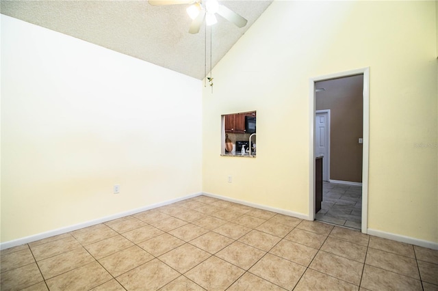 3582 Raintree Ct, Lakeland, FL 33803 - empty room featuring high vaulted ceiling, a ceiling fan, light tile patterned floors, and a textured ceiling