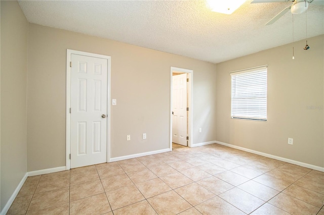 3582 Raintree Ct, Lakeland, FL 33803 - unfurnished room featuring ceiling fan, a textured ceiling, and light tile patterned floors