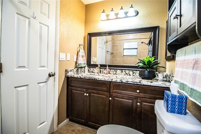 3582 Raintree Ct, Lakeland, FL 33803 - bathroom with a textured wall, vanity, and a shower
