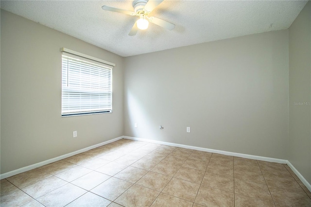 3582 Raintree Ct, Lakeland, FL 33803 - tiled empty room featuring a textured ceiling and ceiling fan