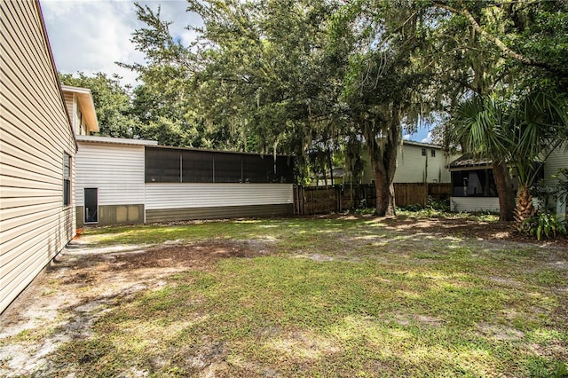 3582 Raintree Ct, Lakeland, FL 33803 - view of yard with a sunroom