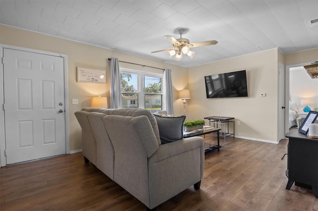 3521 Publix Rd, Lakeland, FL 33810 - living area with dark wood-type flooring and ceiling fan