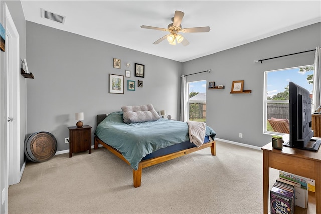 1026 Mohawk Ave NW, Palm Bay, FL 32907 - bedroom featuring light carpet and a ceiling fan