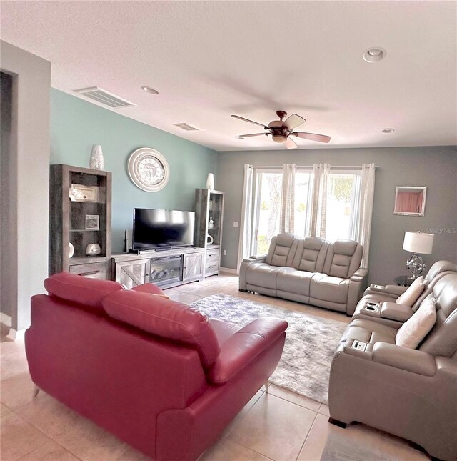 13303 Moss Park Ridge Dr, Orlando, FL 32832 - living room featuring a ceiling fan, light tile patterned flooring, and recessed lighting