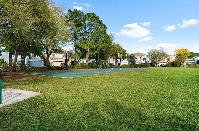 13303 Moss Park Ridge Dr, Orlando, FL 32832 - view of property's community featuring a yard, community basketball court, and a residential view