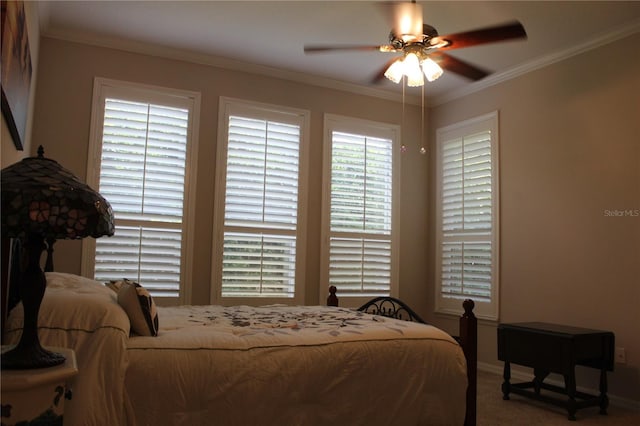 3023 Northfield Dr, Tarpon Springs, FL 34688 - carpeted bedroom with crown molding and ceiling fan