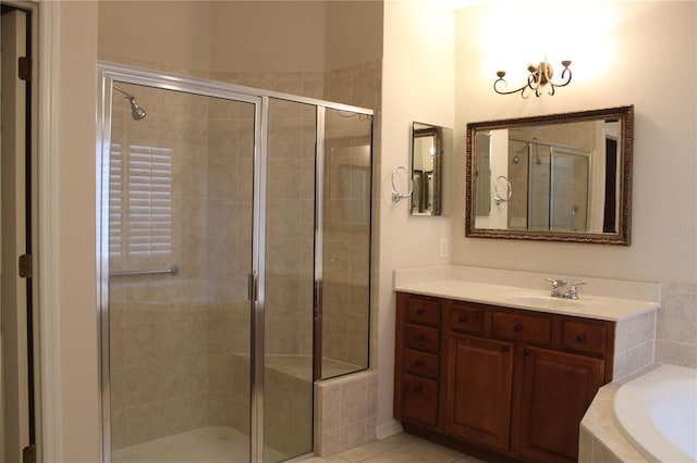 3023 Northfield Dr, Tarpon Springs, FL 34688 - bathroom featuring a stall shower, vanity, and a bath