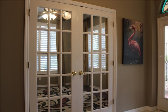 3023 Northfield Dr, Tarpon Springs, FL 34688 - detailed view of french doors and ceiling fan