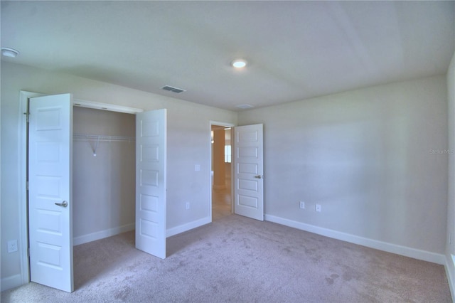 5427 Waterside Dr, Auburndale, FL 33823 - unfurnished bedroom featuring carpet floors and a closet
