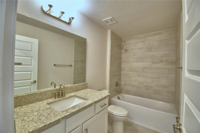 5427 Waterside Dr, Auburndale, FL 33823 - bathroom featuring vanity, a textured ceiling, and shower / bathtub combination