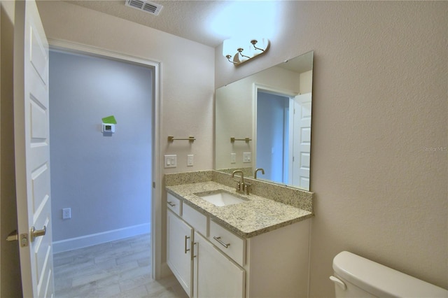 5427 Waterside Dr, Auburndale, FL 33823 - bathroom featuring vanity and toilet