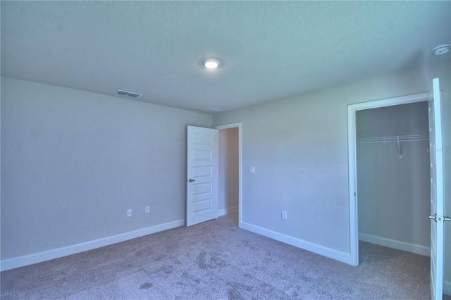 5427 Waterside Dr, Auburndale, FL 33823 - unfurnished bedroom featuring carpet flooring and a closet