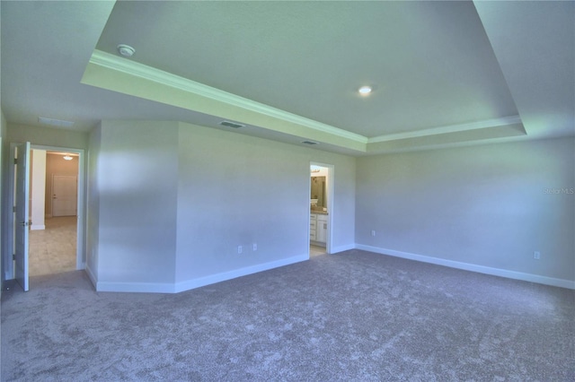 5427 Waterside Dr, Auburndale, FL 33823 - carpeted empty room featuring a raised ceiling, ornamental molding, and a smoke detector