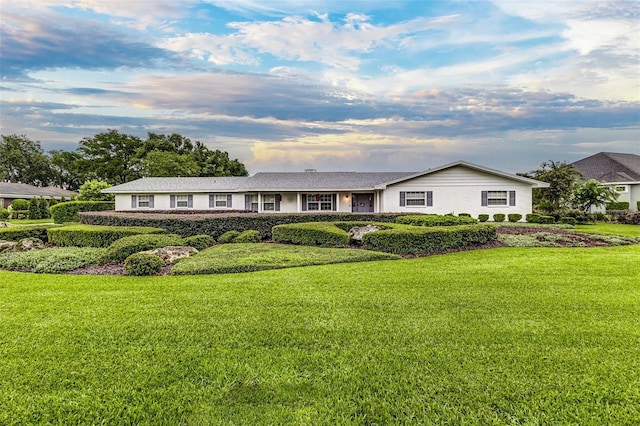 521 Lone Palm Dr, Lakeland, FL 33815 - ranch-style home with a lawn