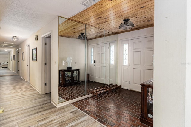 521 Lone Palm Dr, Lakeland, FL 33815 - foyer entrance featuring brick floors and baseboards