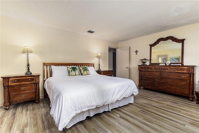 521 Lone Palm Dr, Lakeland, FL 33815 - bedroom with wood finished floors