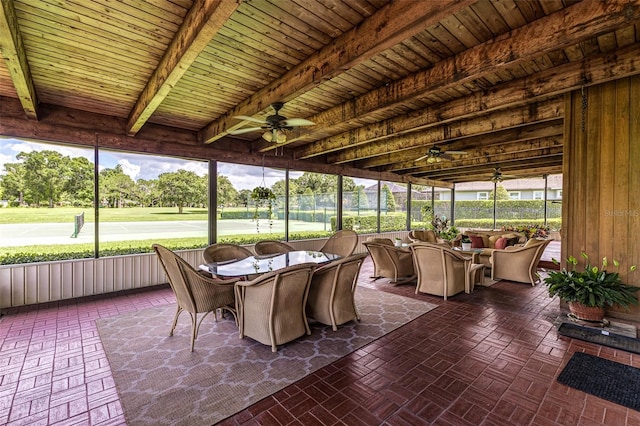 521 Lone Palm Dr, Lakeland, FL 33815 - sunroom / solarium featuring ceiling fan, outdoor dining space, outdoor lounge area, and beamed ceiling