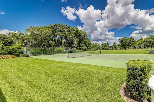 521 Lone Palm Dr, Lakeland, FL 33815 - view of tennis court featuring view of wooded area