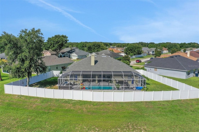 122 Amber Blvd, Auburndale, FL 33823 - view of swimming pool with a residential view, a lanai, and a fenced backyard