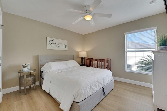 122 Amber Blvd, Auburndale, FL 33823 - bedroom featuring light wood finished floors and ceiling fan