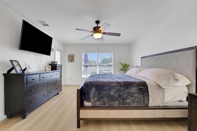 122 Amber Blvd, Auburndale, FL 33823 - bedroom featuring light wood finished floors and a ceiling fan