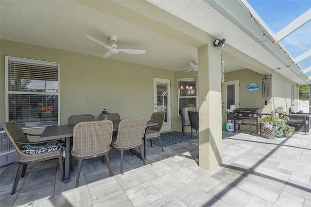 122 Amber Blvd, Auburndale, FL 33823 - view of patio featuring a ceiling fan, outdoor dining space, and a grill