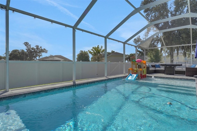 122 Amber Blvd, Auburndale, FL 33823 - view of pool with outdoor lounge area, glass enclosure, and a patio area