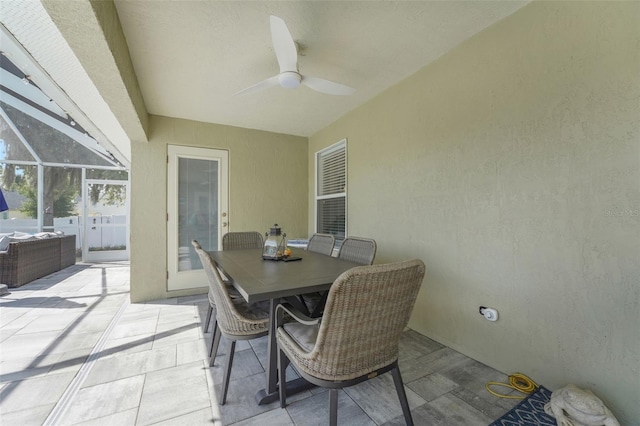 122 Amber Blvd, Auburndale, FL 33823 - view of patio / terrace featuring ceiling fan, outdoor dining area, and glass enclosure