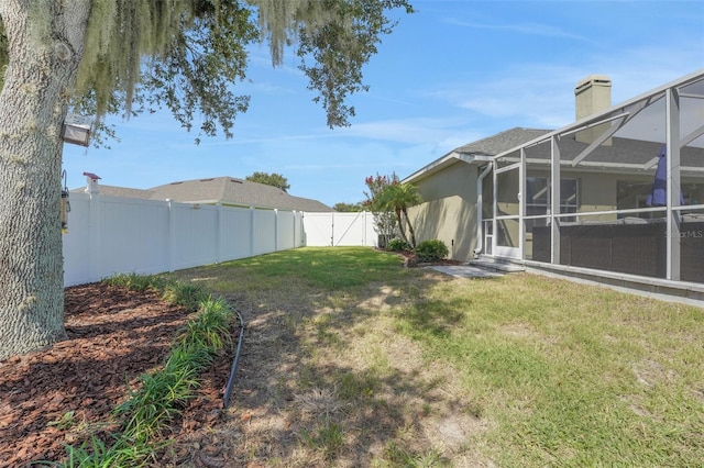 122 Amber Blvd, Auburndale, FL 33823 - fenced backyard with a lanai