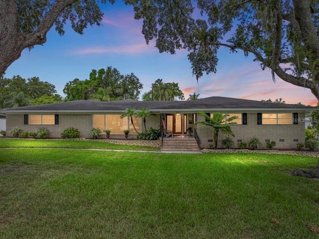 2213 Woodbine Ave, Lakeland, FL 33803 - ranch-style home with a yard and crawl space