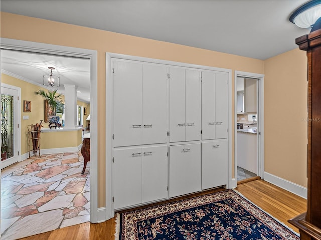 2213 Woodbine Ave, Lakeland, FL 33803 - hall featuring ornamental molding and light wood finished floors