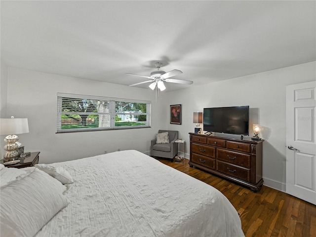 2213 Woodbine Ave, Lakeland, FL 33803 - bedroom featuring dark wood-style flooring and ceiling fan
