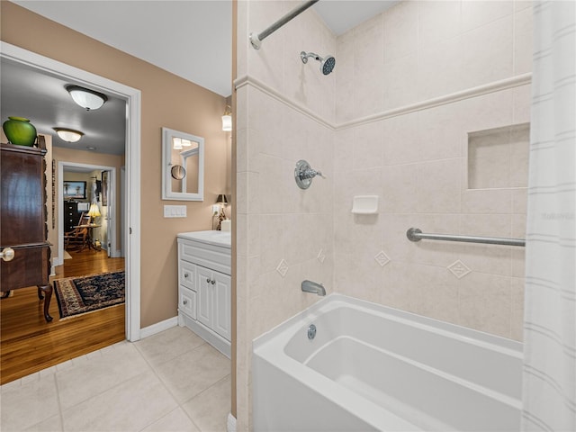 2213 Woodbine Ave, Lakeland, FL 33803 - full bath with shower / tub combo, vanity, and tile patterned floors