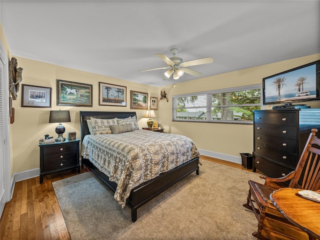 2213 Woodbine Ave, Lakeland, FL 33803 - bedroom with hardwood / wood-style flooring and ceiling fan