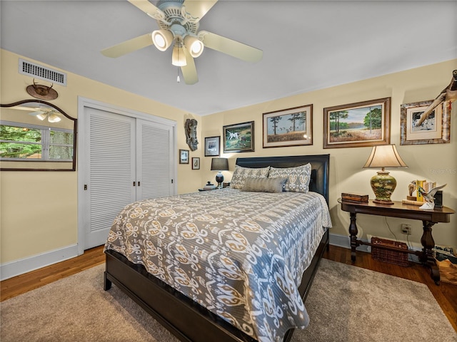 2213 Woodbine Ave, Lakeland, FL 33803 - bedroom featuring a closet, wood finished floors, and a ceiling fan