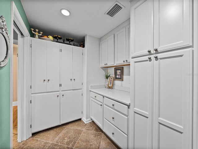 2213 Woodbine Ave, Lakeland, FL 33803 - laundry area with cabinet space