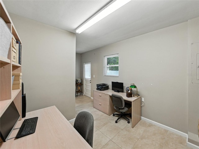 2213 Woodbine Ave, Lakeland, FL 33803 - office space with baseboards and light tile patterned floors