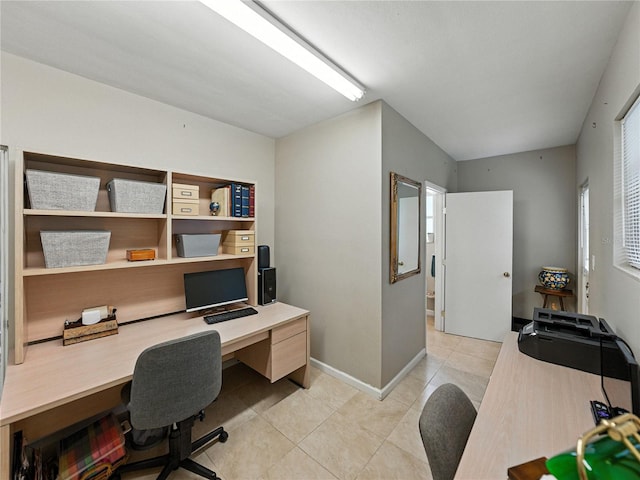 2213 Woodbine Ave, Lakeland, FL 33803 - home office with light tile patterned floors and baseboards