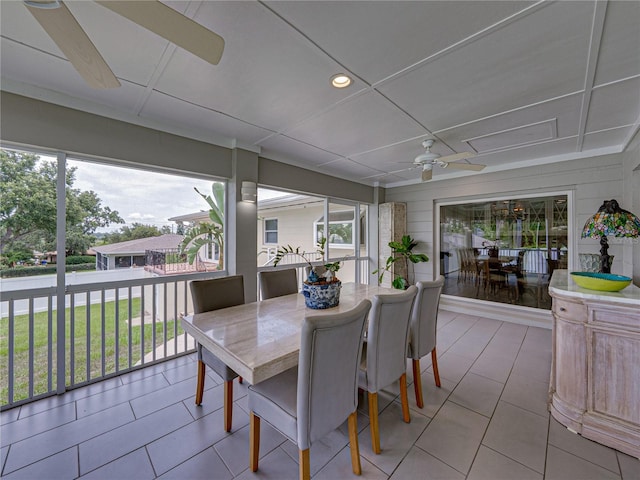 2213 Woodbine Ave, Lakeland, FL 33803 - sunroom featuring a ceiling fan, outdoor dining space, tile patterned flooring, and recessed lighting