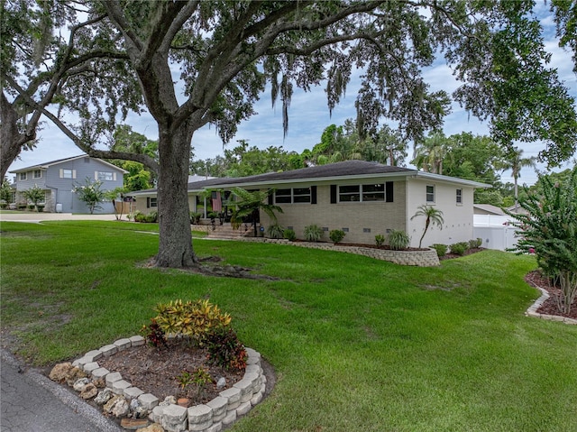 2213 Woodbine Ave, Lakeland, FL 33803 - single story home with brick siding and crawl space