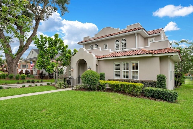207 W Maxwell St, Lakeland, FL 33803 - mediterranean / spanish-style home with stucco siding and a tile roof