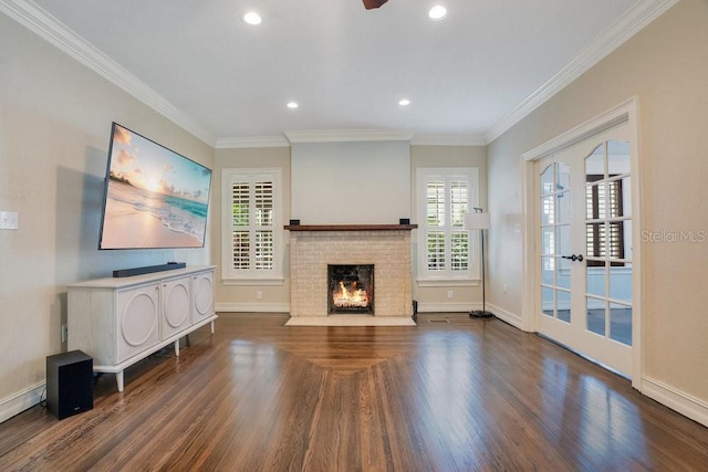 207 W Maxwell St, Lakeland, FL 33803 - unfurnished living room with wood finished floors, a fireplace, crown molding, and recessed lighting