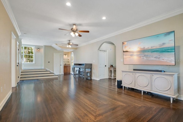 207 W Maxwell St, Lakeland, FL 33803 - living room featuring arched walkways, ceiling fan, ornamental molding, and recessed lighting
