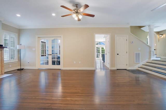 207 W Maxwell St, Lakeland, FL 33803 - unfurnished living room featuring stairway, wood finished floors, crown molding, a ceiling fan, and french doors