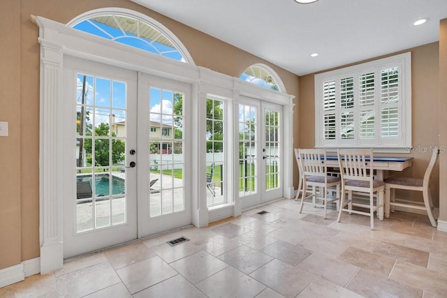 207 W Maxwell St, Lakeland, FL 33803 - doorway to outside with french doors and recessed lighting