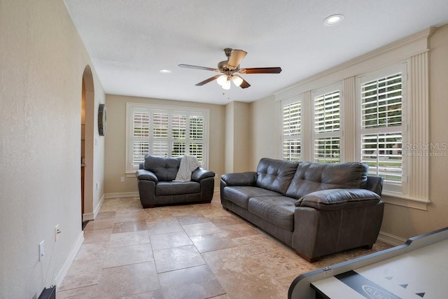 207 W Maxwell St, Lakeland, FL 33803 - living room featuring arched walkways, a ceiling fan, and recessed lighting