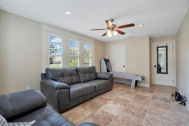207 W Maxwell St, Lakeland, FL 33803 - living room with a ceiling fan, stone tile floors, and recessed lighting