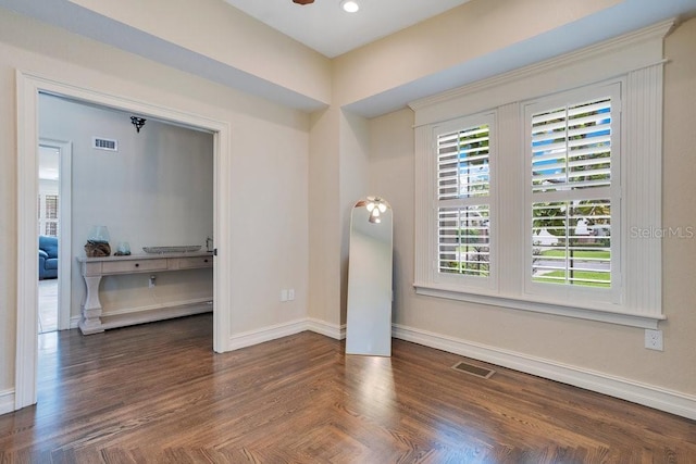 207 W Maxwell St, Lakeland, FL 33803 - spare room featuring baseboards