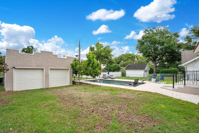 207 W Maxwell St, Lakeland, FL 33803 - view of yard featuring a garage and a patio area